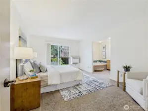 Primary suite with room for a sitting area.