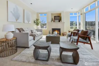Comfortable living room has a handsome gas fireplace that is perfect for those cold winter nights.  There is also direct access to the spacious view deck.