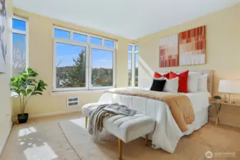 Second bedroom has a double closet and a wall of windows.