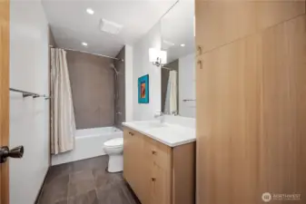 Guest Bath with large tub and stunning spa style.