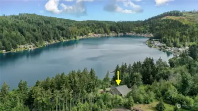 The home is located across the street and high above Summit Lake for breathtaking views.