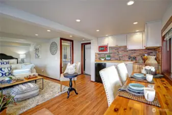 Lower level has a kitchenette. This could be the 3rd bedroom, wine tasting room, office, art studio, yoga studio, and so on! Endless possibilities! It has it's own separate entry.