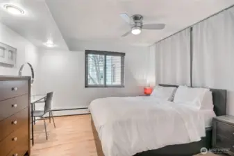 Bedroom with ceiling fan.