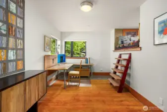 The south facing bedroom with built-in loft space.