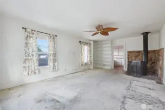 Main living room with wood fireplace