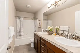 Guest bathroom with dual vanities