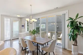 French sliding doors in the dining area offer access to the yard while adding a touch of elegance.