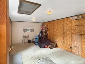 right off the mudroom you'll find the garage.