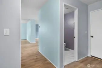 Half bath, easily accessible from all rooms. Garage access on the right.