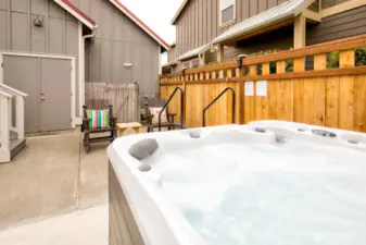 Hot tub and attached storage.