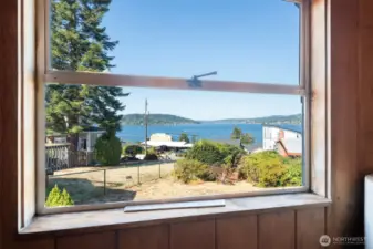 Wake up to serene Lake Washington views right from the first bedroom—just one of the many rooms in the home where you can enjoy a beautiful outlook.