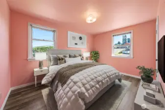 Bedroom Two is Bright and inviting, this bedroom features dual windows for abundant natural light and versatile space to suit your lifestyle. (Virtually Staged).