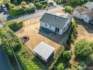 The expansive lot view showcases the fully-fenced open layout and charming gazebo, creating the perfect setting for gatherings.