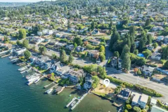 Aerial view showcasing the property’s close proximity to the shared beach access along the shores of Lake Washington. Disclaimer: Title cannot insure beach right access.