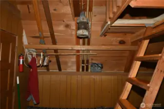 Skis can be easily tucked out of the way ~ brilliant use of space.