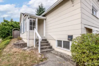 Your guests can enter through the front door, off the front porch, or come straight to the generous backyard through the side gate.