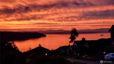 This is a "sunrise home".  The seller caught just one of the many beautiful mornings with this photo.  Not a bad way to start your day.