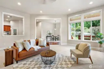 Soaring ceilings throughout the home provide ample space, while ample windows offer plenty of natural light.