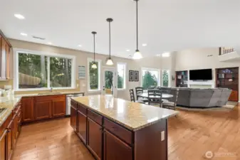 Stainless steel appliances complete the kitchen, offering both style and performance. A perfect setup for home chefs and entertainers alike.