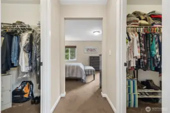 Dual walk-in closets provide exceptional storage and organization. A rare and valuable feature for everyday living.