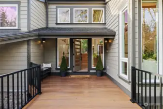 Inviting front porch with new composite decking and railing