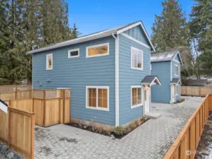 Come see this new construction home with a private garage and an off-street parking spot