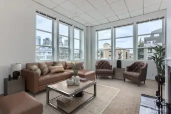 Fall in love with this corner unit, these gorgeous windows say it all. Newer blinds on all will stay.