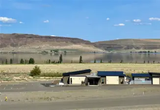 View from ground level looking east toward the river and clubhouse