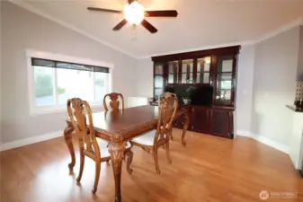A large dining area with built in hutch