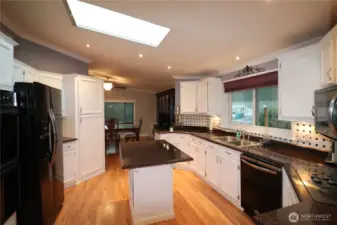 Large and inviting kitchen with a skylight