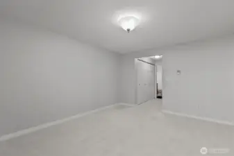 Primary bedroom with ensuite ¾ bath and abundant closet space