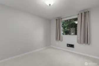Second bedroom perfect for guests, office, or flexible use