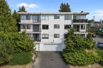 Sunset Villa community with secure entry and covered garage parking