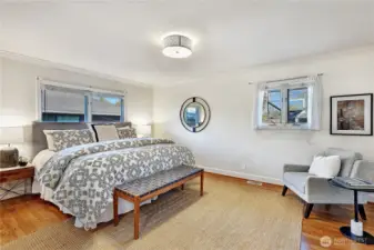 Main floor primary bedroom with attached bathroom