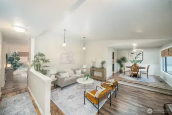 Upon entry, step right to the sunken living space and dining room.