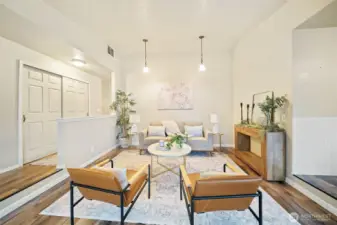 Another view of the sunken living space.  XL hall coat closet.