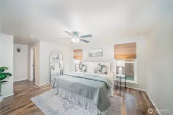 Primary Bedroom with 3/4 bath and walk in closet.