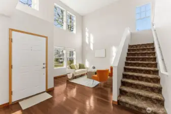 Vaulted ceilings and hardwood floors welcome you to this 1800+ SF home.
