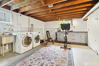 Currently used as a workout room, a portion of this room can be easily converted into a second bathroom.
