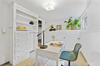 The lower level office space offers considerable storage with painted built-ins.