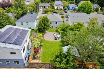 The incredible backyard is fully landscaped, perfect for relaxing or entertaining.