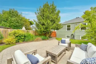 The incredible backyard is fully landscaped, perfect for relaxing or entertaining.