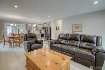 Open to dining room and kitchen