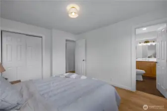 PRIMARY BEDROOM w/ ENSUITE