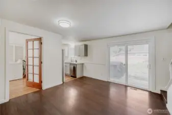 Bright and functional kitchen featuring sleek quartz counters and stainless steel appliances in this beautifully updated 4-bedroom home. Open-concept design flows seamlessly into the living and dining areas — perfect for everyday living and entertaining in Redmond’s sought-after Union Hill neighborhood.