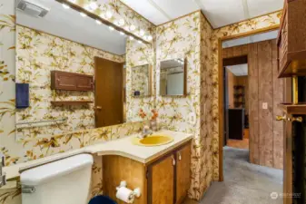 Main bathroom with lovely wallpaper!