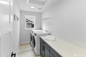 Upper level laundry with lots of room to work