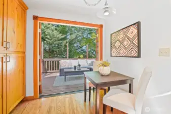 The kitchen eating nook has french doors that open the to huge wrap around deck.