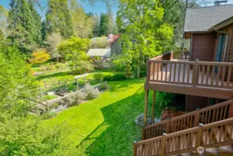 The 0.323 acre lot has two large grass areas and an established, organic garden.