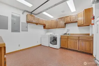 Utility and Laundry room on the lower level. The home is wired for a generator.